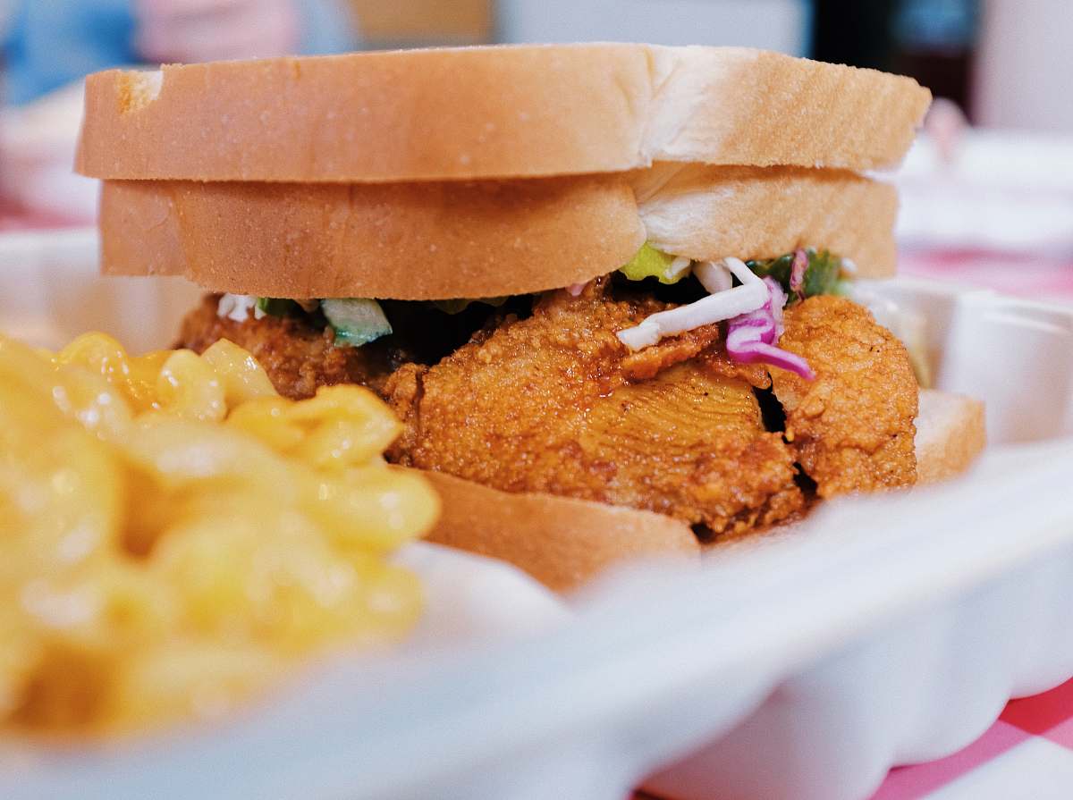 hot chicken takeover sandwich on tray bread